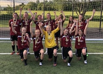 Under 14's Girls' Football Team crowned Surrey champions!